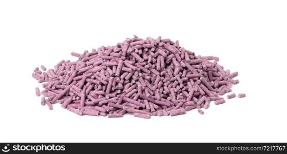 pile of pressed purple cat litter isolated on white background. Granules with lavender scent, close up