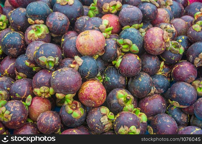 Pile of ripe mangosteen pattern texture background