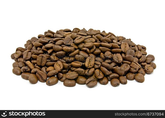 pile of roasted coffee beans over white background