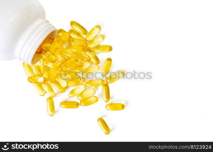 Pile of softgels capsules Omega 3 in bottle isolated on white background. Close up, top view, flat lay with copy space. Pile of capsules Omega 3 isolated on white background