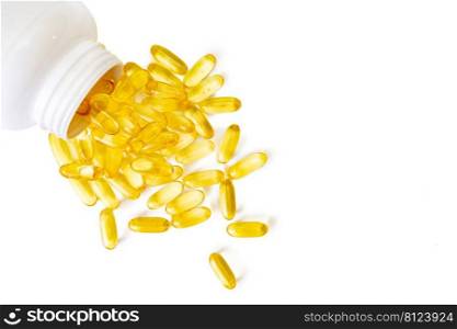 Pile of softgels capsules Omega 3 in bottle isolated on white background. Close up, top view, flat lay with copy space. Pile of capsules Omega 3 isolated on white background