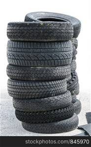 pile of stacked old car tires
