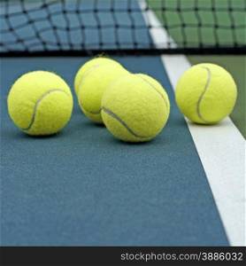 pile of tennis ball on court background