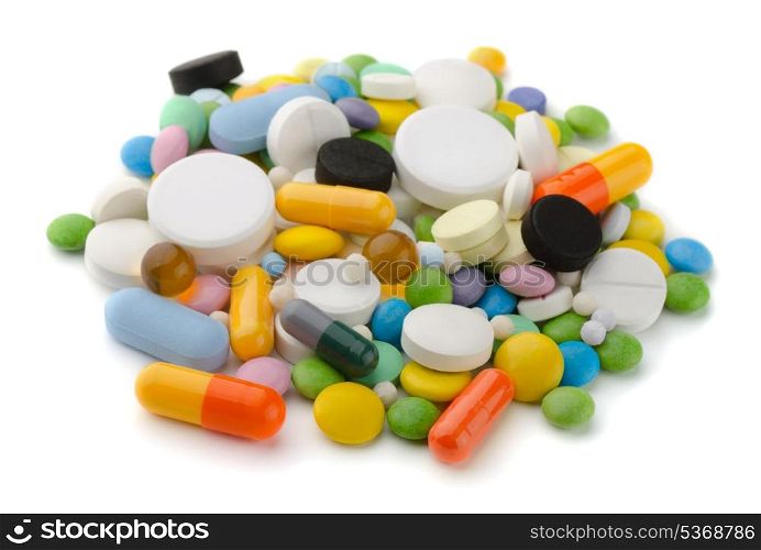 Pile of various colorful pills isolated on white