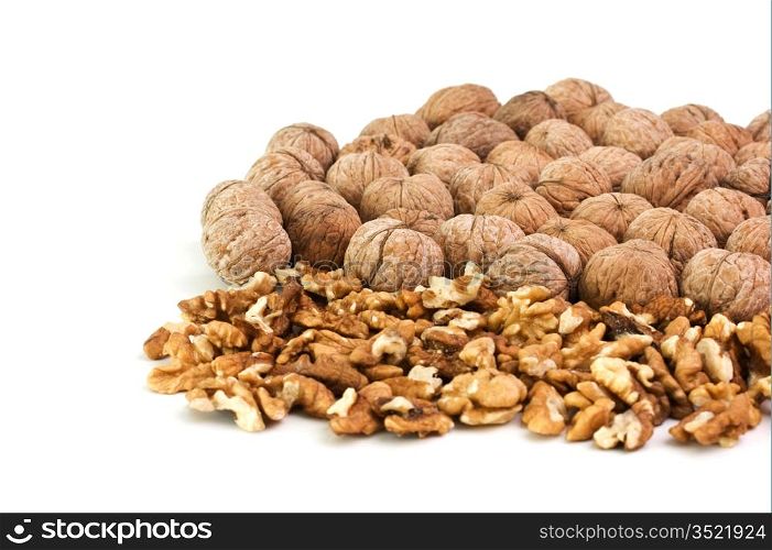 pile of walnuts isolated on a white background