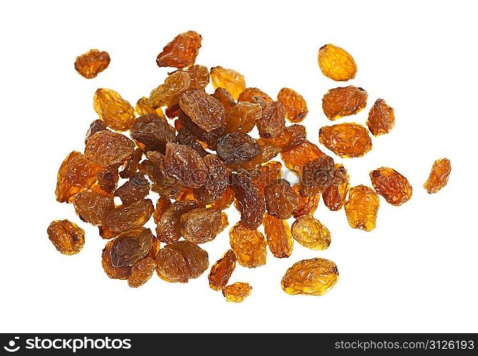 Pile of yellow sultana raisins on white