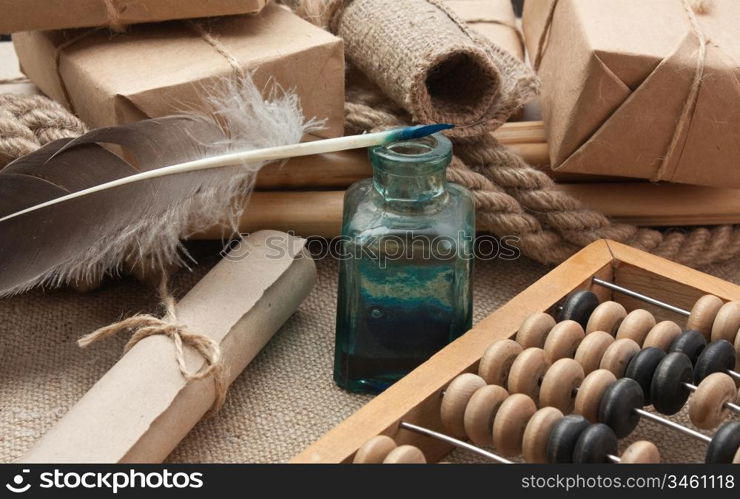 pile parcel wrapped with brown kraft paper and abacus