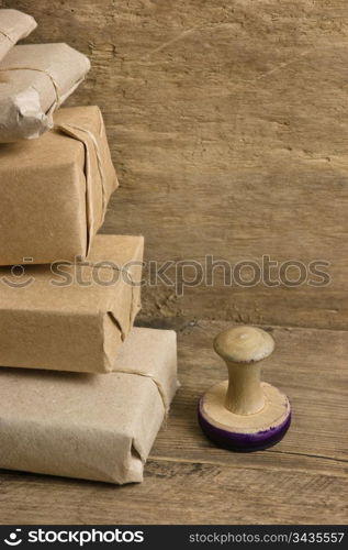 pile parcel wrapped with brown kraft paper and tied with twine