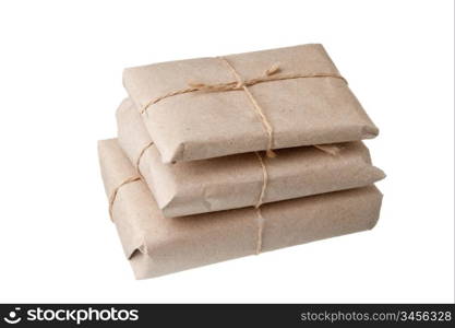 pile parcel wrapped with brown kraft paper isolated on white background