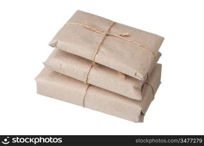 pile parcel wrapped with brown kraft paper isolated on white background