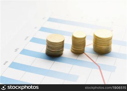 piles coins top graph. High resolution photo. piles coins top graph. High quality photo