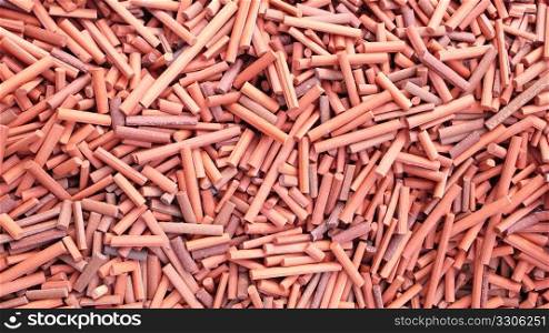 Piles of clay stick pieces as a background