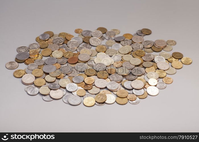 Piles of coins isolated on gray