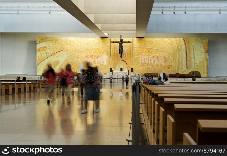 Pilgrims visiting the Basilica of the Most Hole Trinity in the Sanctuary of Our Lady of the Rosary in Fatima, Portugal