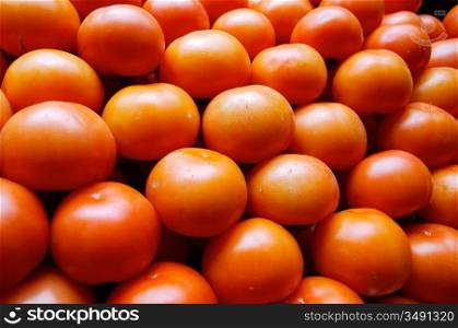 piling up of tomatoes in a store of fruits