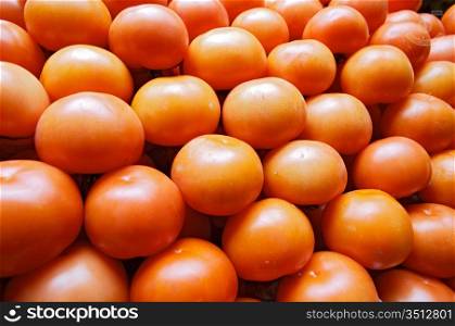 piling up of tomatoes in a store of fruits