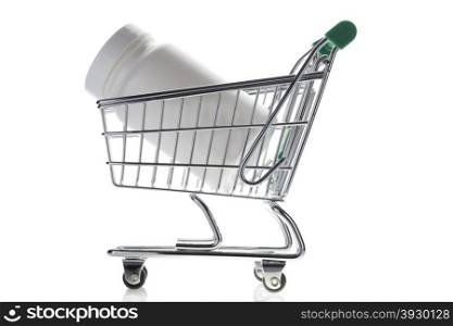 Pill bottle in shopping cart isolated on white.. Pill bottle in shopping cart isolated on white. Concept. online store pharmacy