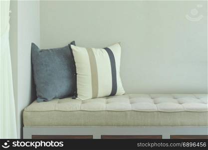 Pillows on comfy seat in living room