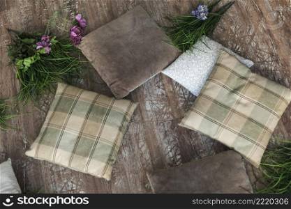 pillows with flowers wooden floor