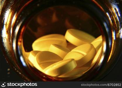 Pills, a selection of pharmaceutical drugs, Legal drugs, packaging, capsules. Bottle of pills Moody Lighting.