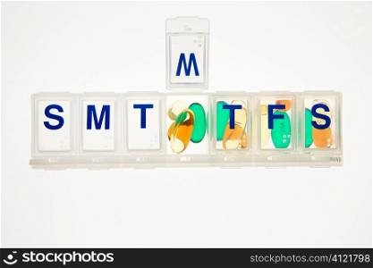 Pills in a Pill Organizer. Isolated