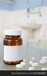 Pills on bathroom shelf