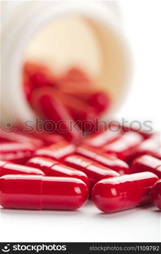 Pills spilling from an open bottle
