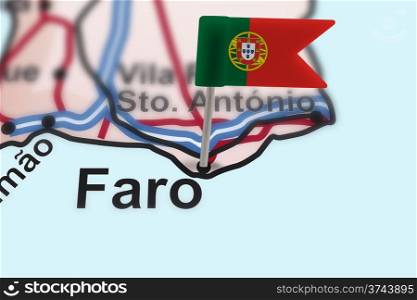 pin with flag of Portugal in Faro. pin with flag of Portugal in Faro with selective focus