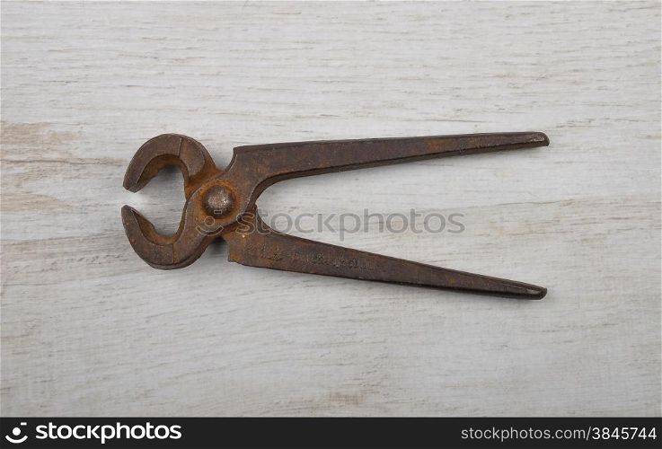 Pincers on wood