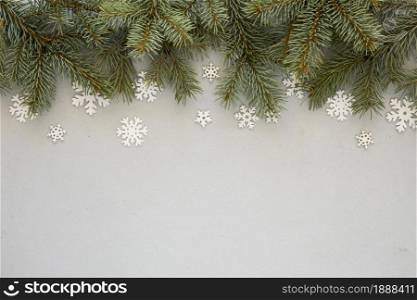 pine needles grey background with snowflakes . Resolution and high quality beautiful photo. pine needles grey background with snowflakes . High quality and resolution beautiful photo concept