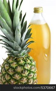 Pineapple and a bottle of juice