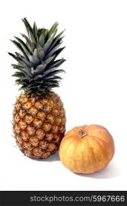 pineapple and a pumpkin in a white background