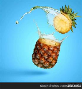 Pineapple juice. Image of fresh pineapple in juicy splashes