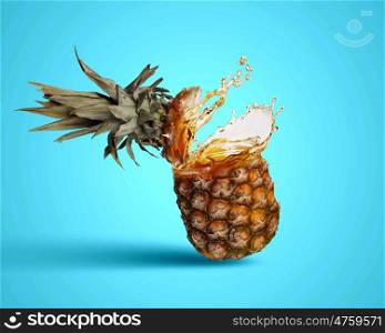 Pineapple juice. Image of fresh pineapple in juicy splashes