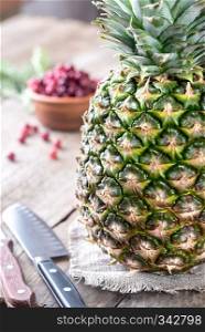Pineapple on the wooden background