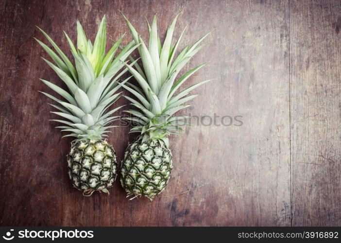pineapple on wooden background