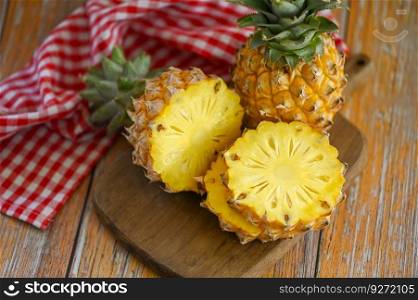 pineapple slice wooden cutting board for food fruit ripe pineapple on background, fresh pineapple tropical fruits summer - top view 