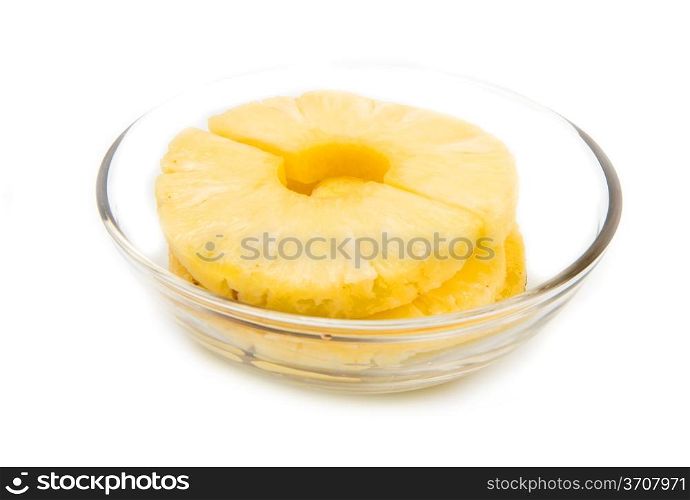 Pineapple Slices On glass bowl isolated on White Background
