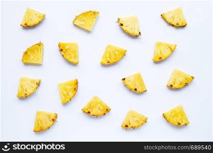Pineapple slices on white background.