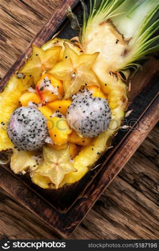 Pineapple stuffed with exotic fruits