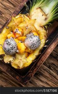 Pineapple stuffed with exotic fruits