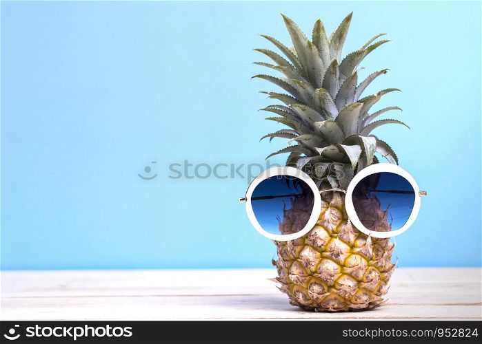 Pineapple with Sunglasses Fashion Summer Party and Holiday concept