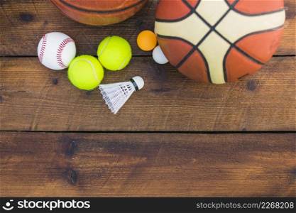 ping pong ball baseball shuttlecock basketball tennis ball wooden plank