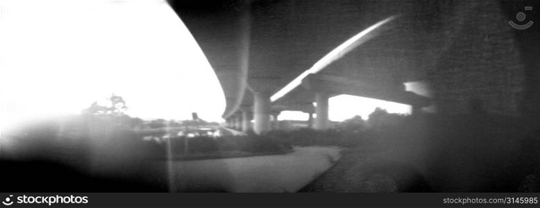 Pinhole camera image of under a freeway.