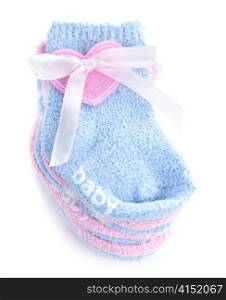 Pink and blue infant socks for baby shower with ribbon
