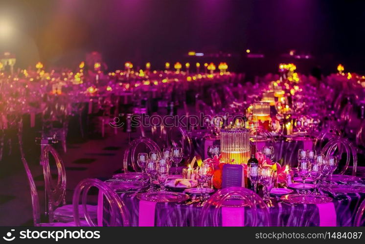 Pink and Purple Christmas Decor with candles and lamps for a large party or Gala Dinner