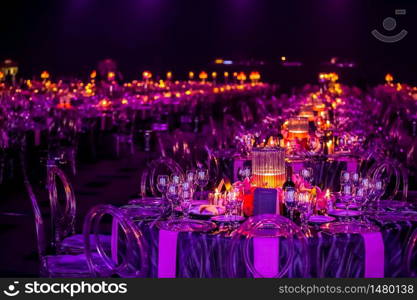 Pink and Purple decor with table lamps at gala dinner event