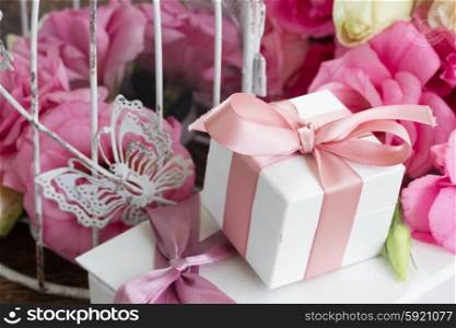 pink and white flowers. bunch of pink and white fresh roses and eustoma flowers with gift box