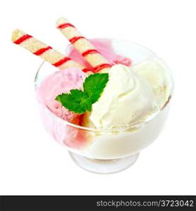 Pink and white ice cream with wafer rolls and mint in glass isolated on white background