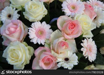 pink and white mixed floral arrangement roses and gerberas
